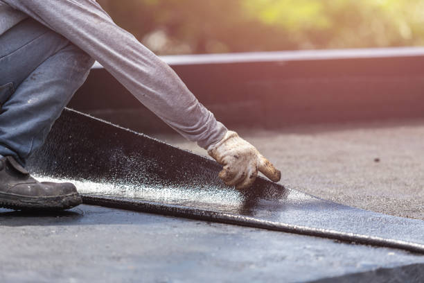 Professional Basement Waterproofing technician working in Overland Park, KS